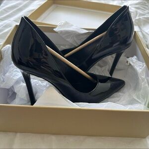 Black glossy Michael Kors heels size 5.